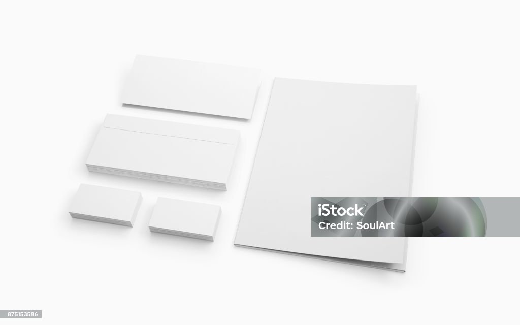 Blank stationery isolated on white. Blank stationery isolated on white. Envelopes, folder and cards to showcase your presentation. Office Supply Stock Photo