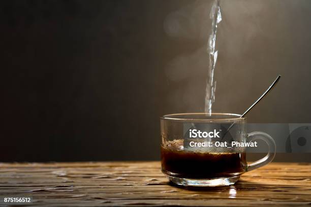 Hot Coffee On A Wooden Table In The Dark Stock Photo - Download Image Now - Art, Arts Culture and Entertainment, Breakfast