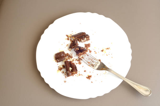 top view of leftover chocolate cake stock photo