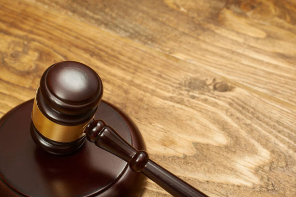 istock Judge gavel on wooden table. 875160148