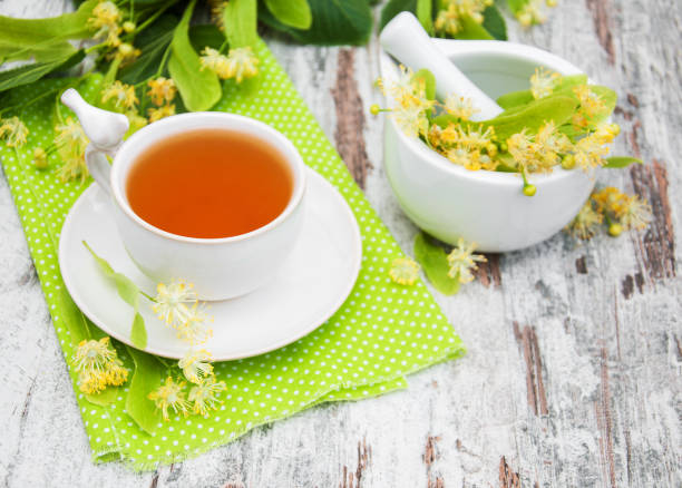 istock cup of herbal tea with linden flowers 875161282