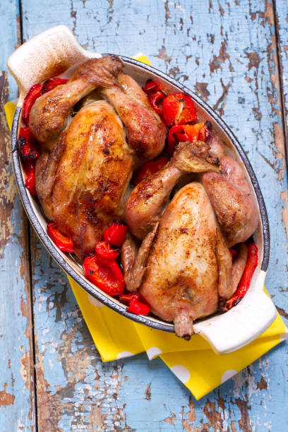 istock Whole baked chicks with lemon, paprika and cayenne pepper 875161942