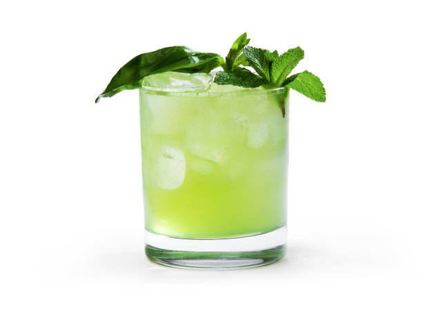 Superb cocktail with gin Superb cocktail with gin and ice on white background lime basil plant stock pictures, royalty-free photos & images