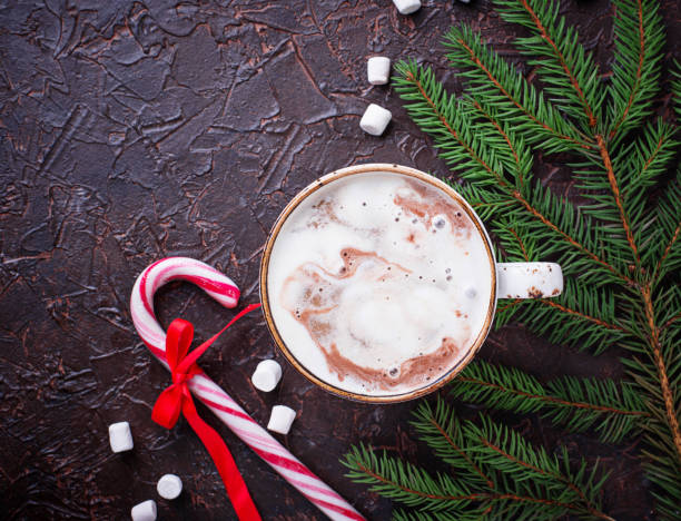 istock Christmas background with latte and candy cane 875165642