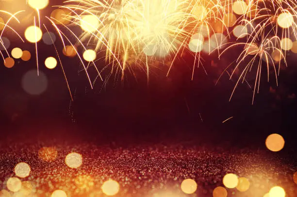 Photo of Fireworks and bokeh in New Year eve and space for text. Abstract background holiday.