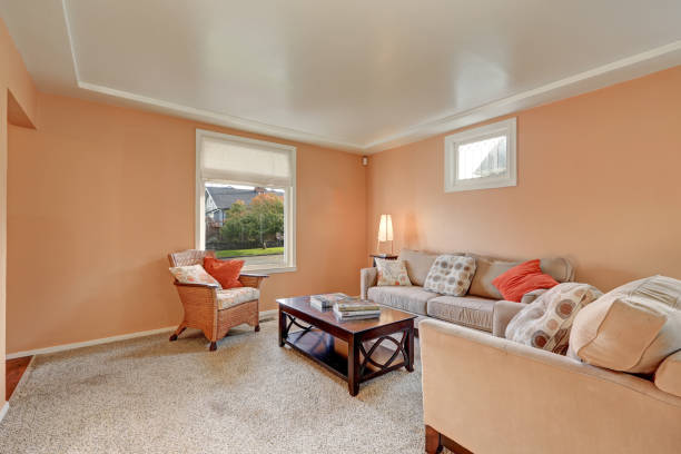 istock Cozy living room interior with peach walls 875171932