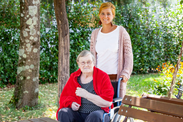 istock Senior Woman and Caretaker 875172124