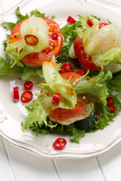 istock Low-calorie turkey and onion burger with lettuce, tomatoes and cucumbers 875179898