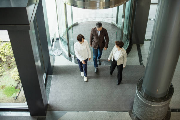 istock Walking in the office with colleagues 875179904