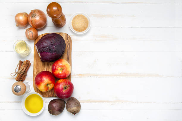 istock Red cabbage, onions, beets, apples, sugar, cinnamon sticks, salt, pepper, vinegar and olive oil 875182988