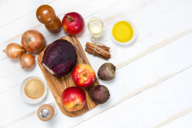 istock Red cabbage, onions, beets, apples, sugar, cinnamon sticks, salt, pepper, vinegar and olive oil 875183020