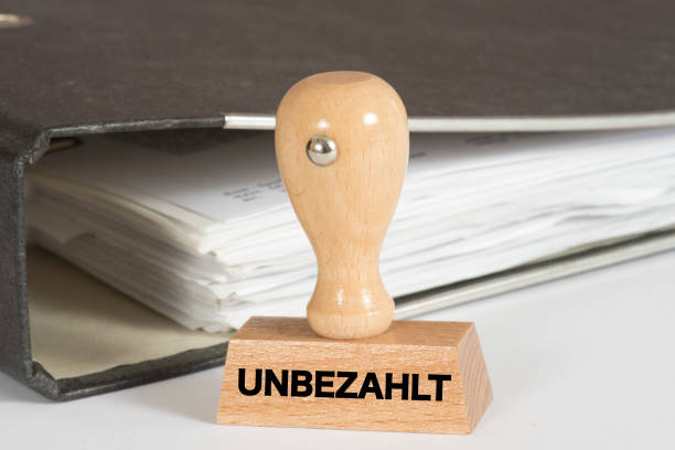 istock A folder with invoices and stamps with the imprint Unpaid 875185992