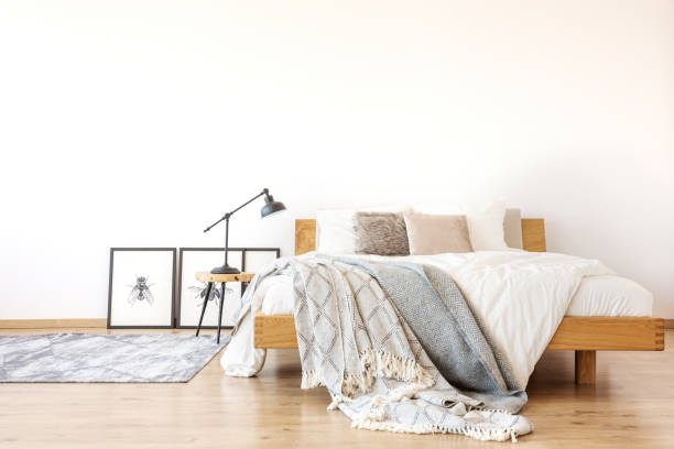 istock Wooden king-size bed in bedroom 875186770