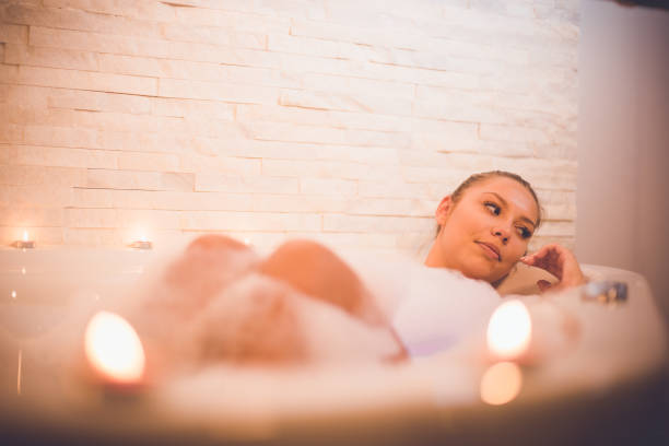 istock Attractive blonde in jakuzzi 875187076