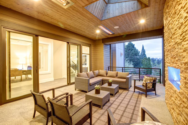 istock Dreamy outdoor covered patio with stone fireplace 875190082