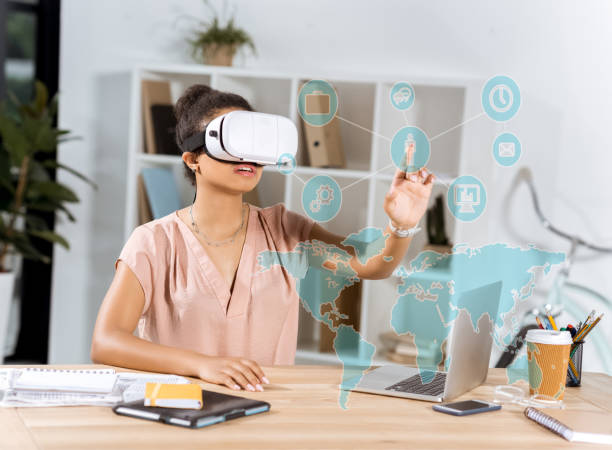 istock business woman in vr headset at work place 875197908
