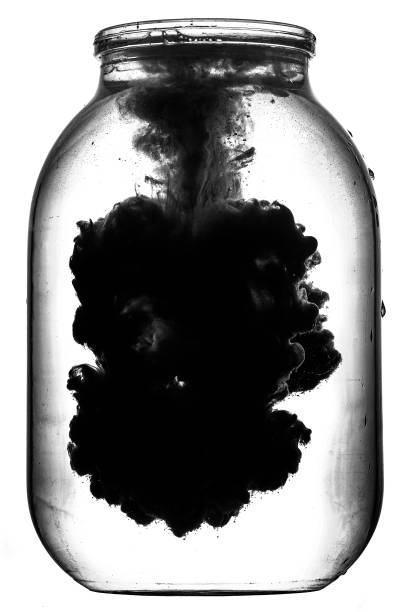 istock Paint swirling in water. 875198830