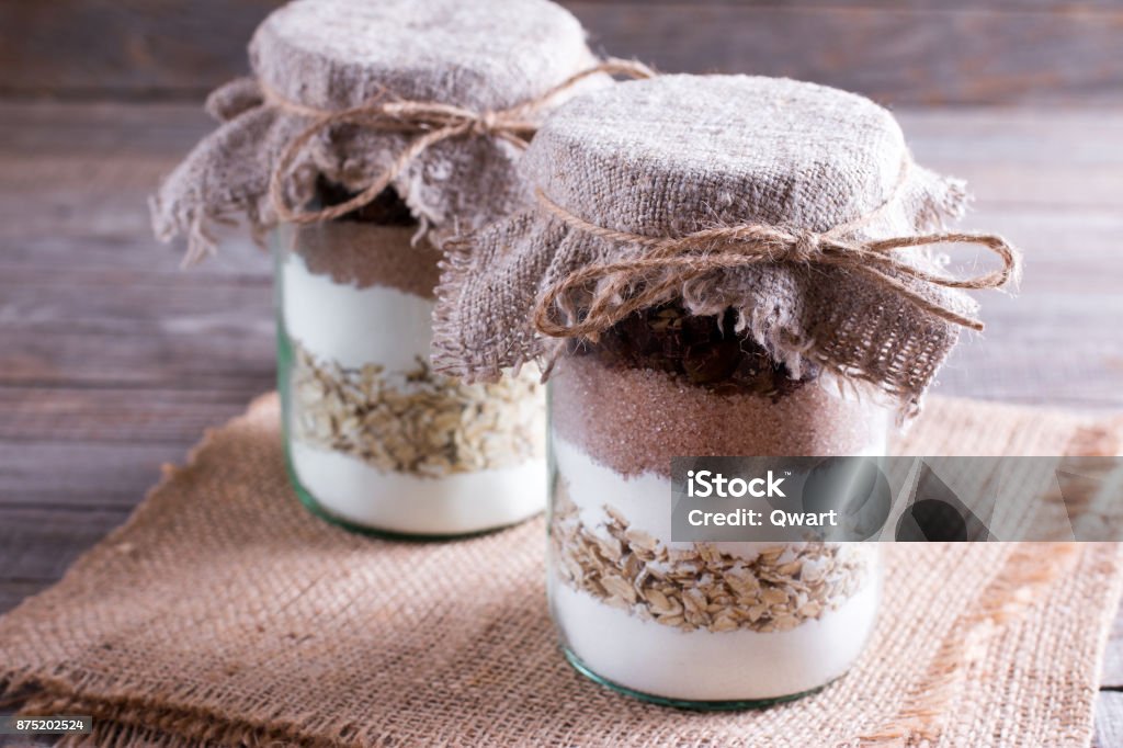 Mixing of ingredients for cookies in a jar. Christmas concept Cake Stock Photo