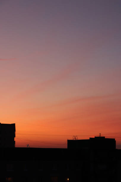 istock Shining Morning Clear Sky Color Gradient up on Living Building Roofs. 875218116