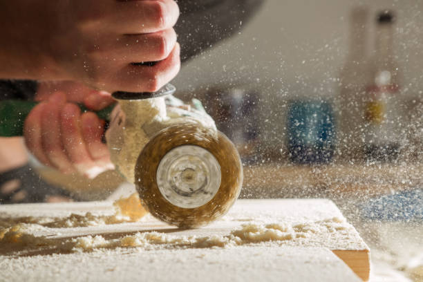 istock Method of artificial aging of wood. Drill with a wire brush. 875218386
