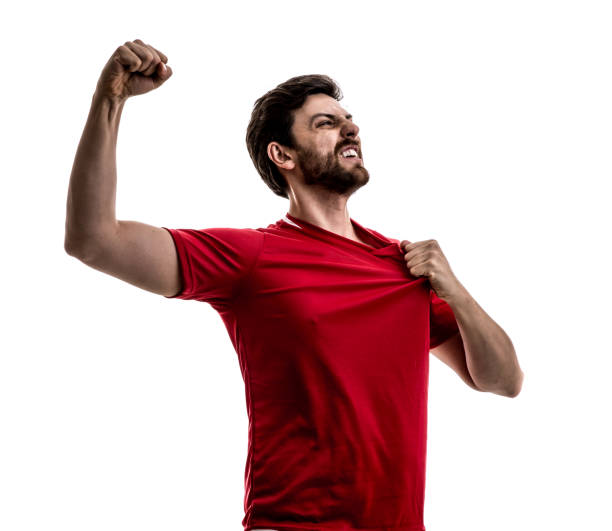 istock Fan / Sport Player on red uniform celebrating on white background 875218410