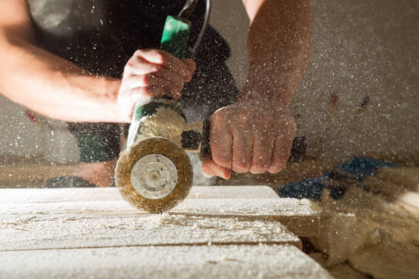 istock Method of artificial aging of wood. Drill with a wire brush. 875218656