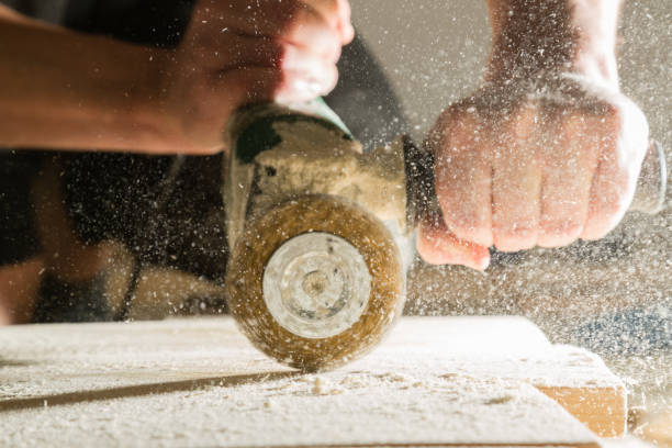 istock Method of artificial aging of wood. Drill with a wire brush. 875218660