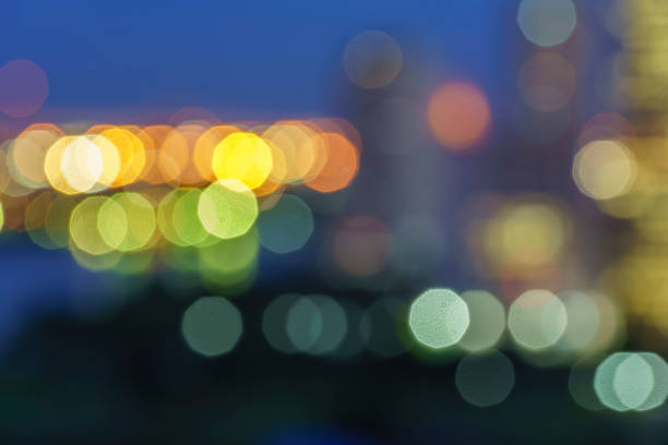 istock Defocused lights abstract colorful nonagon bokeh background 875228362