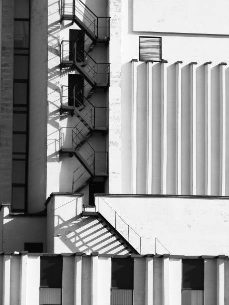 istock Front view of the facade with a fire staircase and vertical concrete structure. 875230420