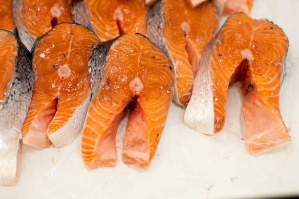 istock frozen red fish steaks in a market 875231084