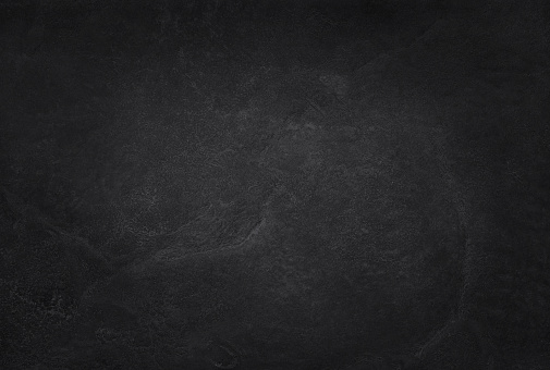 Textura pizarra negro gris oscurezca en el patrón natural de alta resolución de fondo y diseño de obras de arte. Pared de piedra negra. photo