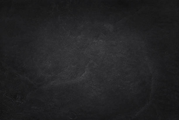 donker grijs zwart leisteen structuur in natuurlijke patroon met hoge resolutie voor achtergrond en ontwerp kunstwerk. zwarte stenen muur. - graniet fotos stockfoto's en -beelden