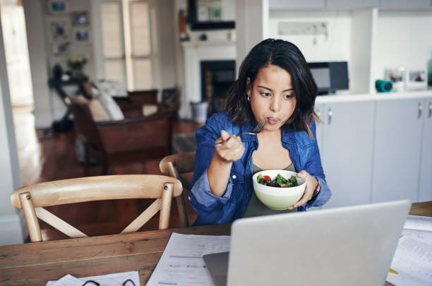 Making her lunch break a healthy one stock photo