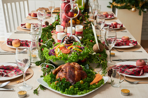Food and decorations on Christmas dinner table