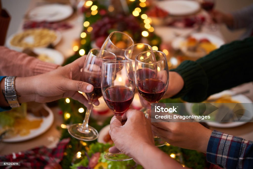 Toasting for Christmas Group of people toasting for Christmas Christmas Stock Photo