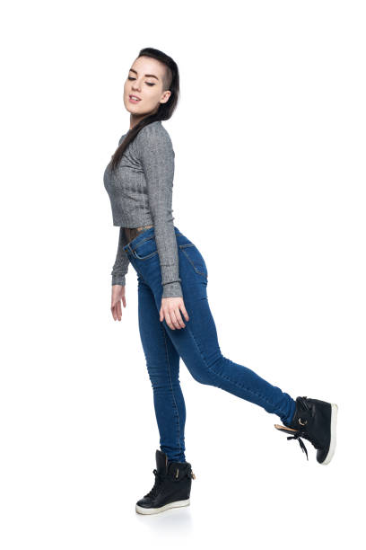 istock Full length funky woman walking 875254968