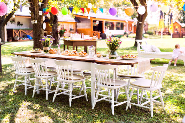 istock Table set for a garden party or celebration outside. 875261726