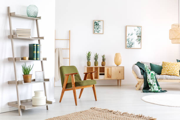 istock Relax room with green armchair 875265484