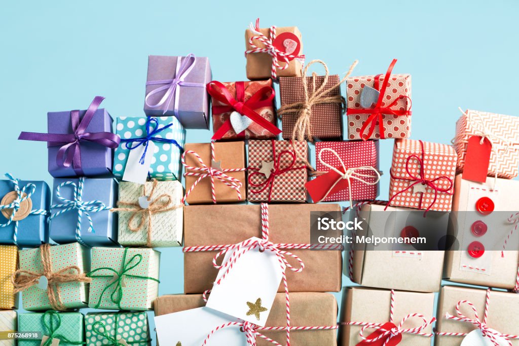 Collection of Christmas present boxes Collection of Christmas present boxes on a light blue background Gift Stock Photo