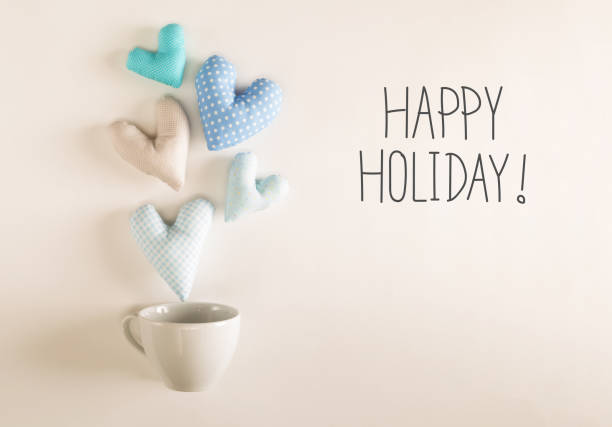istock Happy Holiday message with blue heart cushions 875269046