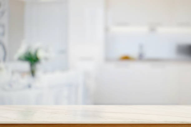 istock Smart Display Concept. Empty marble top table in modern kitchen room. for product montage display. 875273838