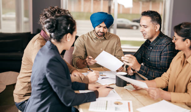 istock Discussing new strategy in a boardroom 875274856