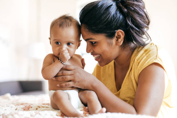 istock Mom and baby indoor 875274958