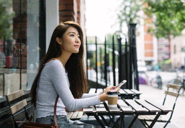 Young Woman With Smartphone