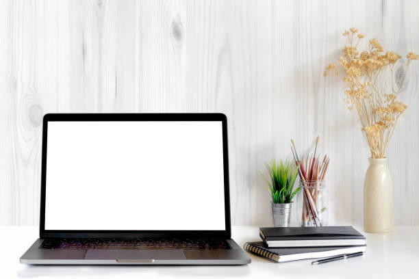 istock Mock up : Workspace with laptop computer, Craft tools, Books, pen at home or studio. Mock up desk space and blank screen laptop for graphics display montage. 875281480