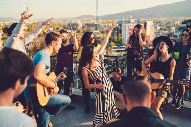 istock Rooftop party with live music 875285048