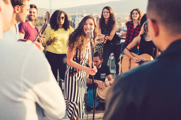 istock Rooftop party with live music 875285086