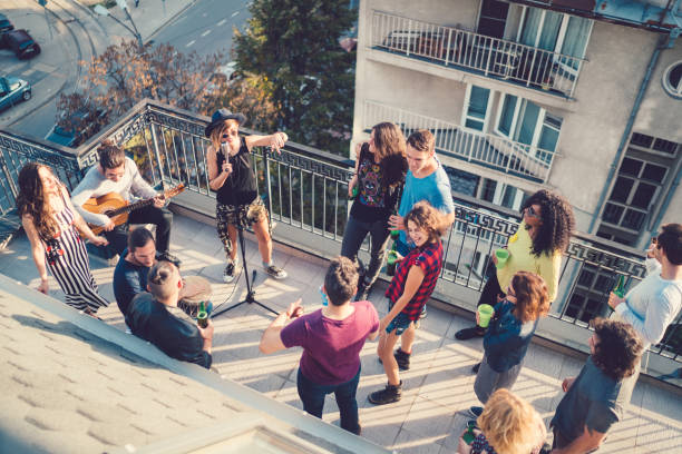istock Music band performing on party 875285606