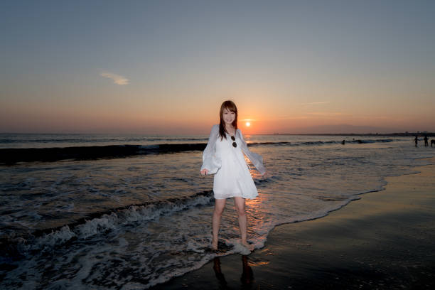 istock woman of the beach 875285992