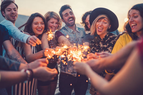 istock Best friends partying on rooftop 875286022